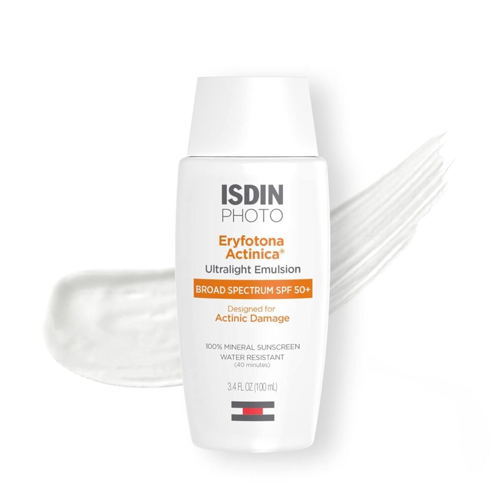 Product photo of ISDIN Photo Eryfotona Actinica Ultralight Emulsion sunscreen in a white bottle with white cap. Label indicates Broad Spectrum SPF 50+, designed for actinic damage, 100% mineral sunscreen, water resistant for 40 minutes