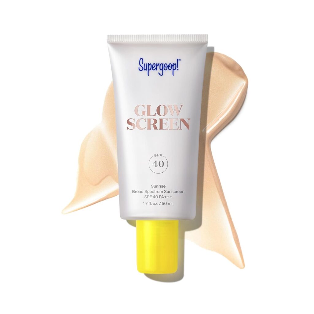 "Product photo of Supergoop! Glowscreen sunscreen tube with bright yellow cap. White tube displays product name in rose gold lettering, SPF 40