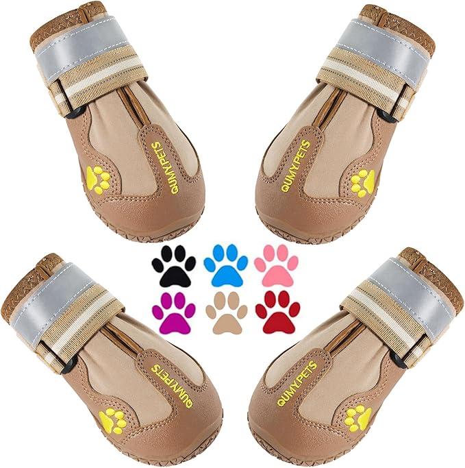 Set of four tan dog sun protection boots with reflective straps and paw print designs, providing paw protection for hot surfaces and rough terrain.