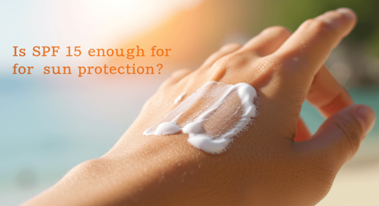 Close-up of hand with sunscreen being applied with text overlay asking "Is SPF 15 enough for sun protection?