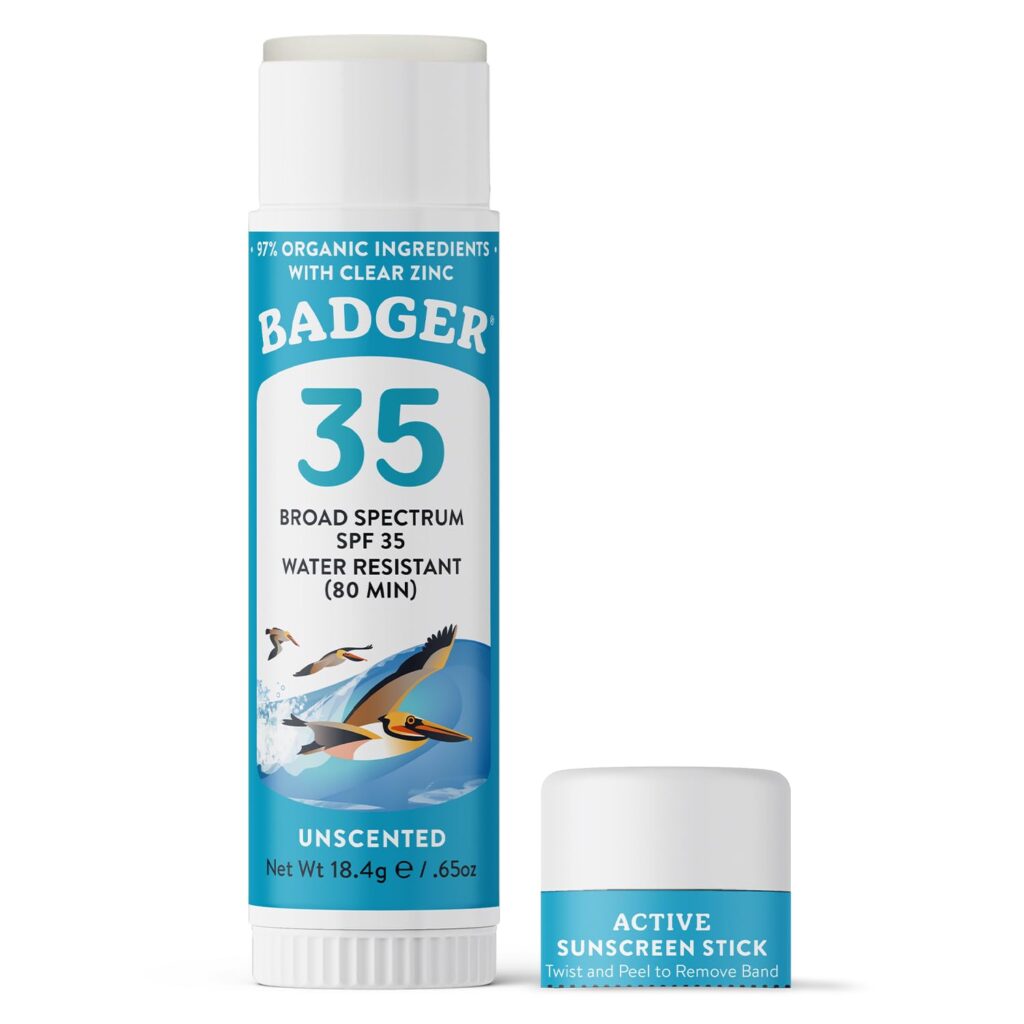Badger SPF 35 sunscreen stick in white twist-up tube with turquoise label featuring seabird artwork, unscented formula with 97% organic ingredients and clear zinc oxide