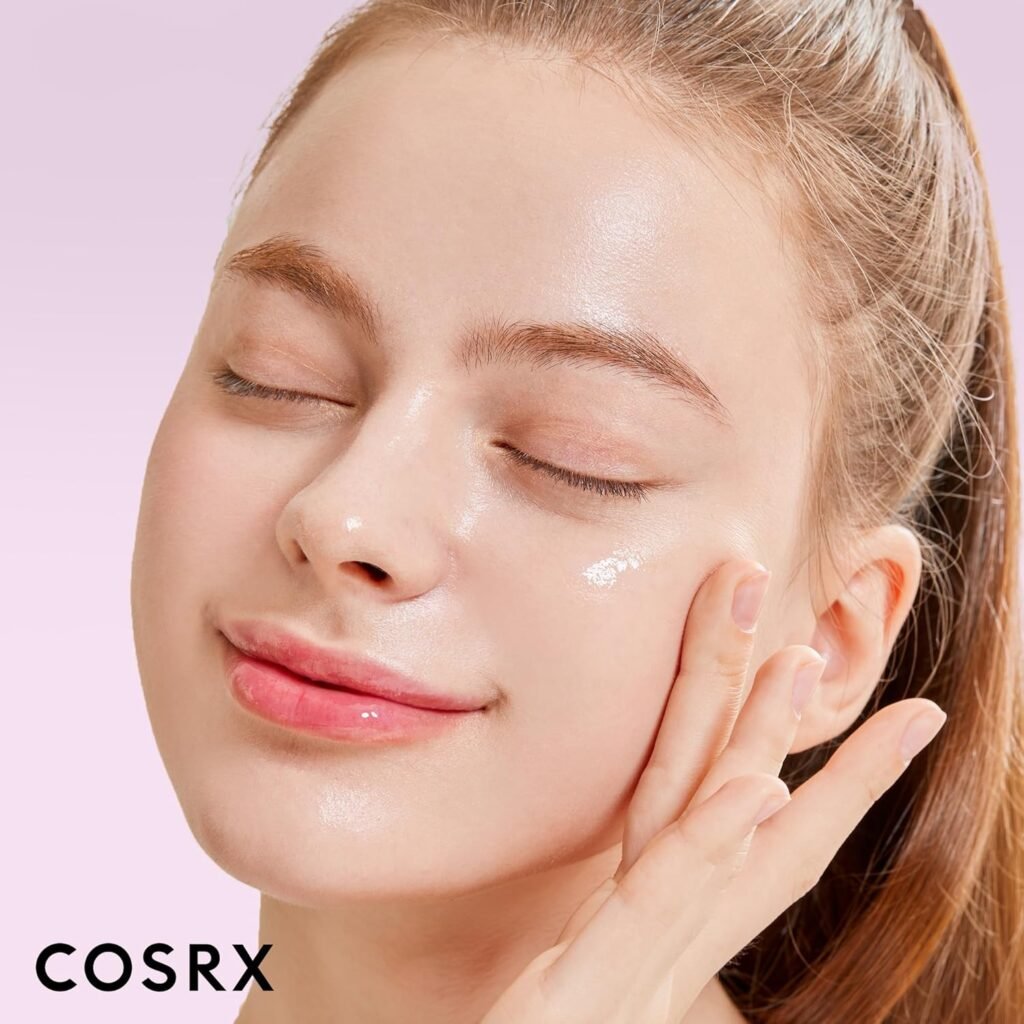 Woman applying COSRX skincare products showing dewy, healthy skin finish