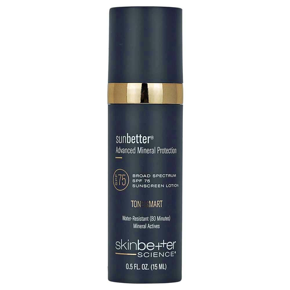 SkinBetter Science Sunbetter Advanced Mineral Protection SPF 75 sunscreen lotion in a dark navy blue bottle with gold accent band, 0.5 FL OZ (15 ML) size